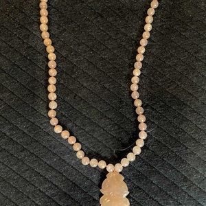 Rose quartz necklace with carved  piece